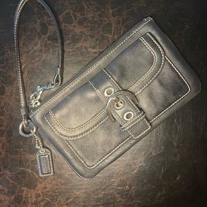 Black coach wristlet with buckle